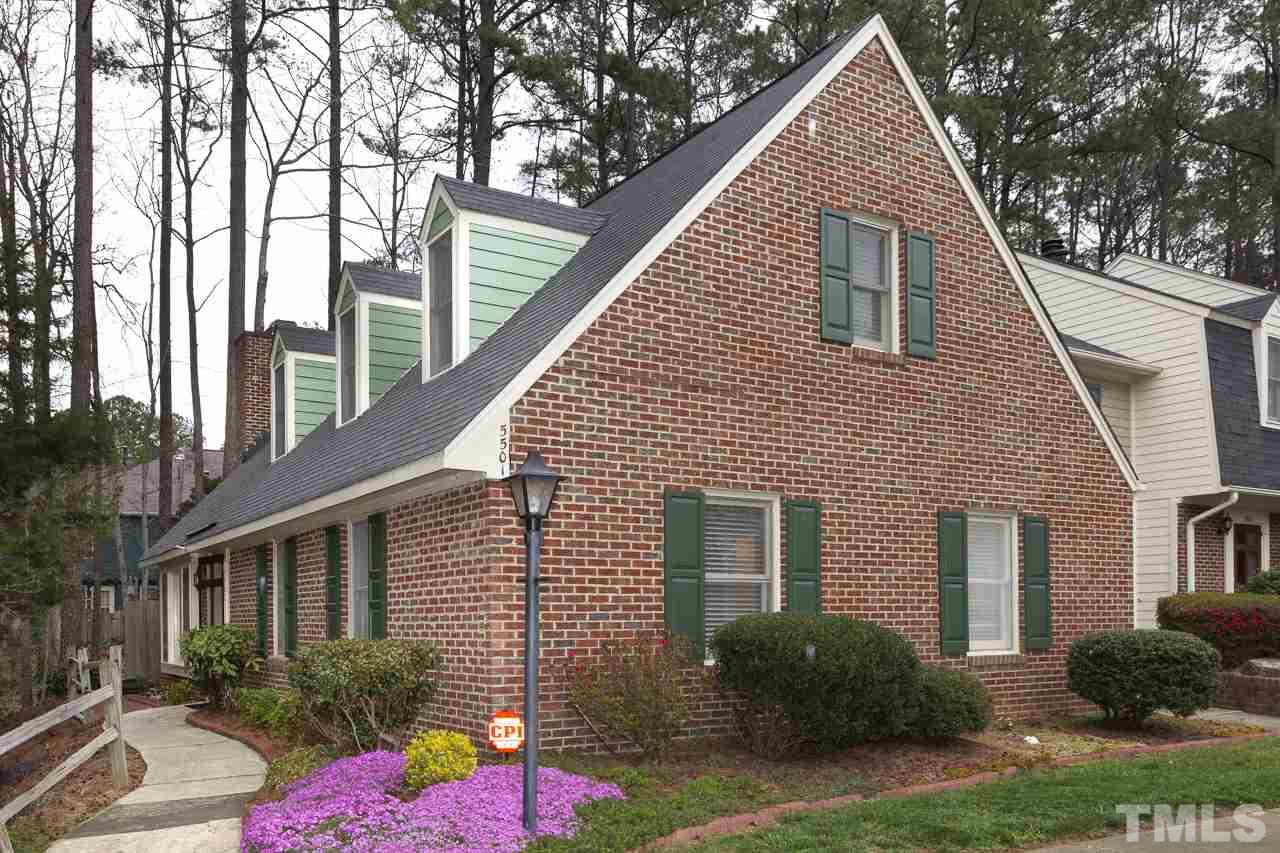 5501 Hamstead Crossing Raleigh, NC 27612 - Photo 1 of 25 a view of house with a yard and potted plants
