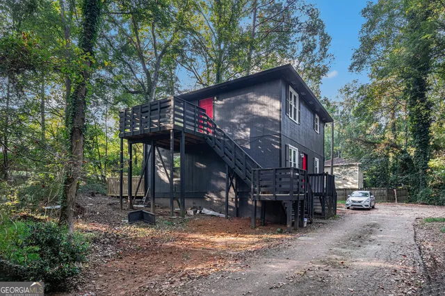 a house view with a backyard space