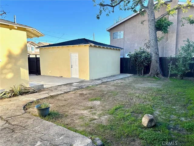 a view of a back yard of the house