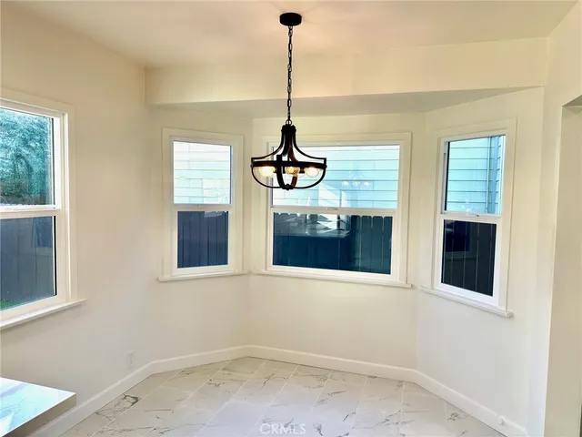 a bathroom with a sink and a window
