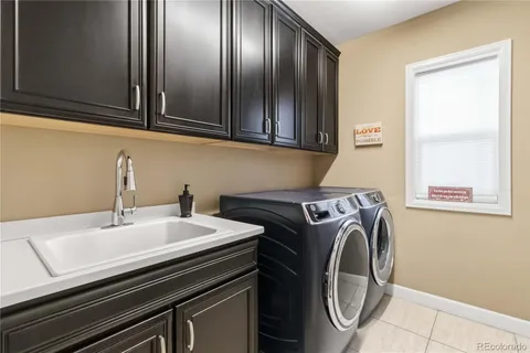 a bathroom with a granite countertop toilet sink and shower