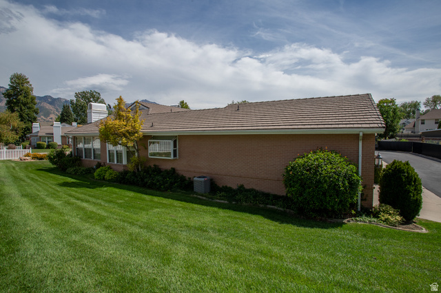 5302 South Birch Pt Road Murray, UT 84117 - Photo 26 of 29 Expansive lawn area with mature landscaping