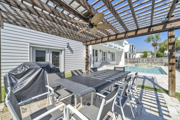 a living room with a couch and a couch with projector