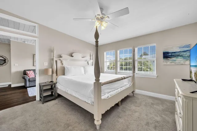 a front view of a house with a yard table and chairs