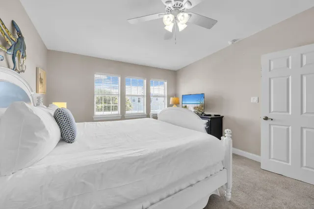 an aerial view of residential building and ocean