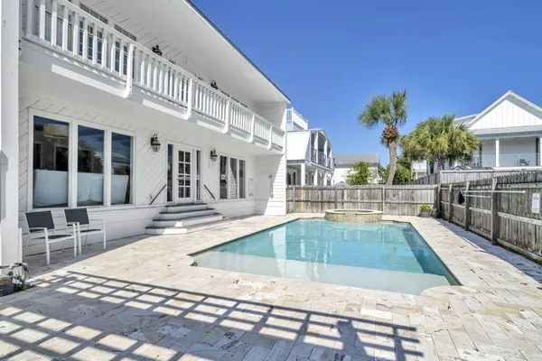 a living room with furniture fireplace and a fireplace