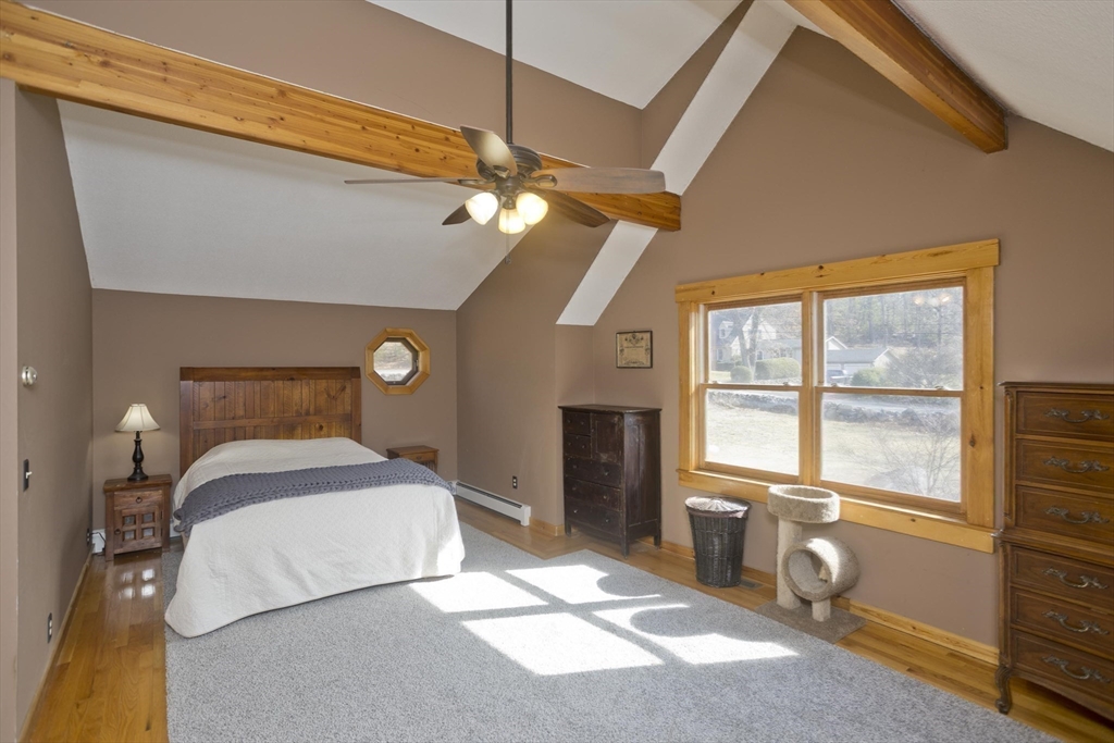 2136 Baptist Hill Road Palmer, MA 01069 - Photo 12 of 41 a bedroom with a bed and a window