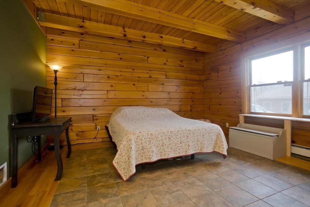 2136 Baptist Hill Road Palmer, MA 01069 - Photo 21 of 41 a bedroom with a bed and a desk