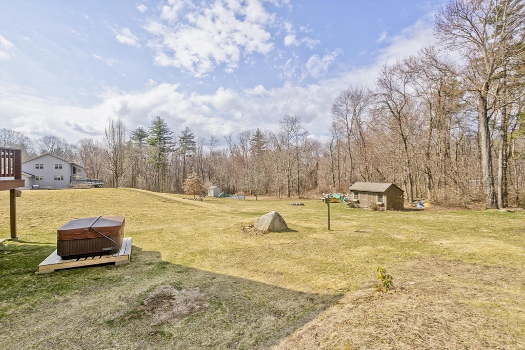 2136 Baptist Hill Road Palmer, MA 01069 - Photo 36 of 41 a view of swimming pool with a yard and trees