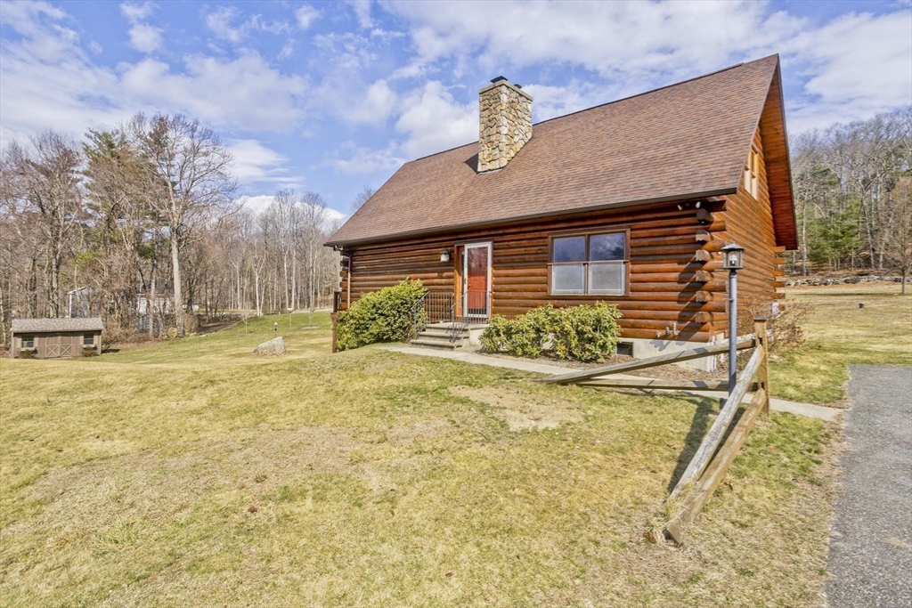 2136 Baptist Hill Road Palmer, MA 01069 - Photo 40 of 41 a view of a house with yard and sitting area