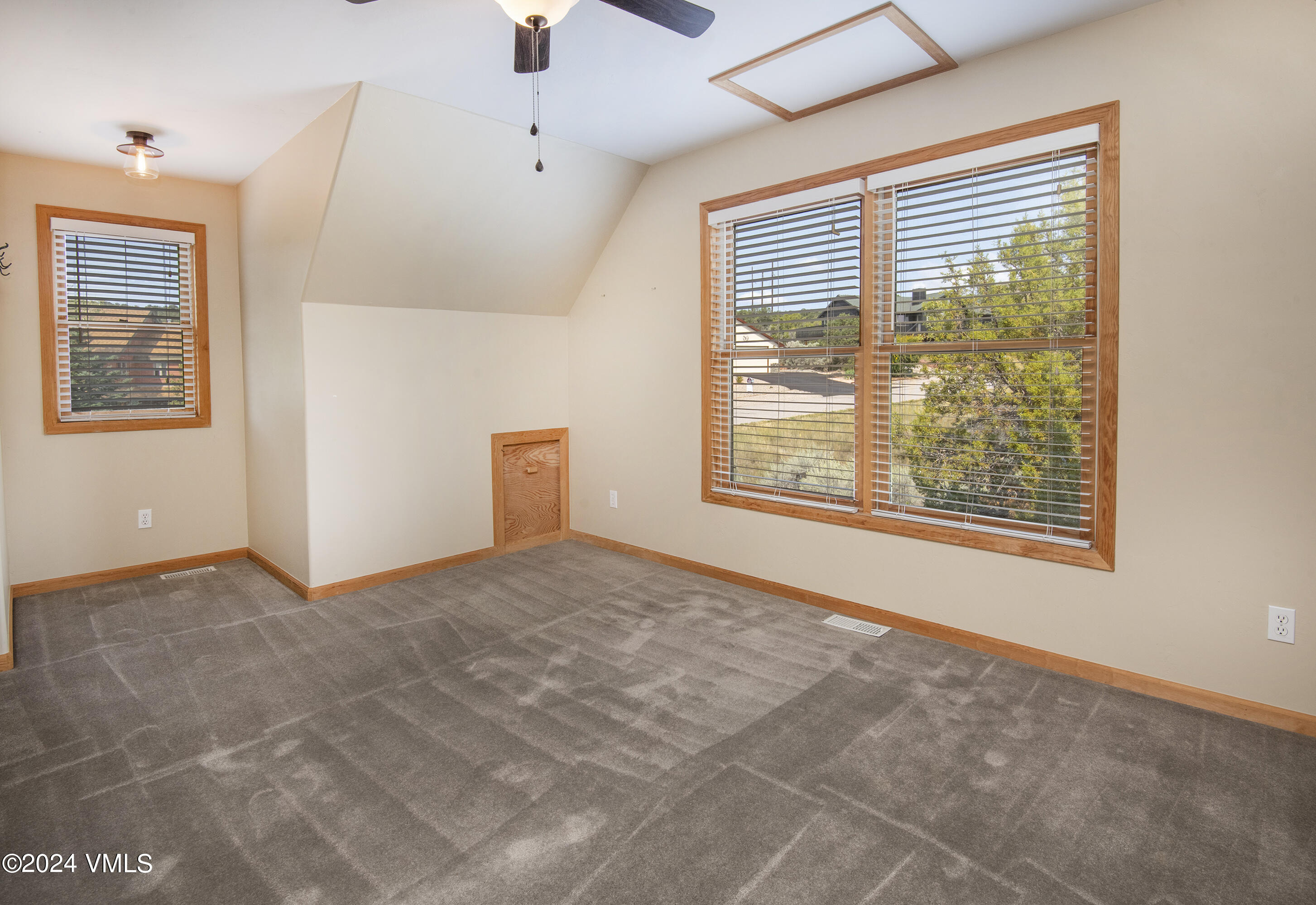 490 Neilson Gulch Road Eagle, CO 81631 - Photo 18 of 55 a view of an empty room with a window