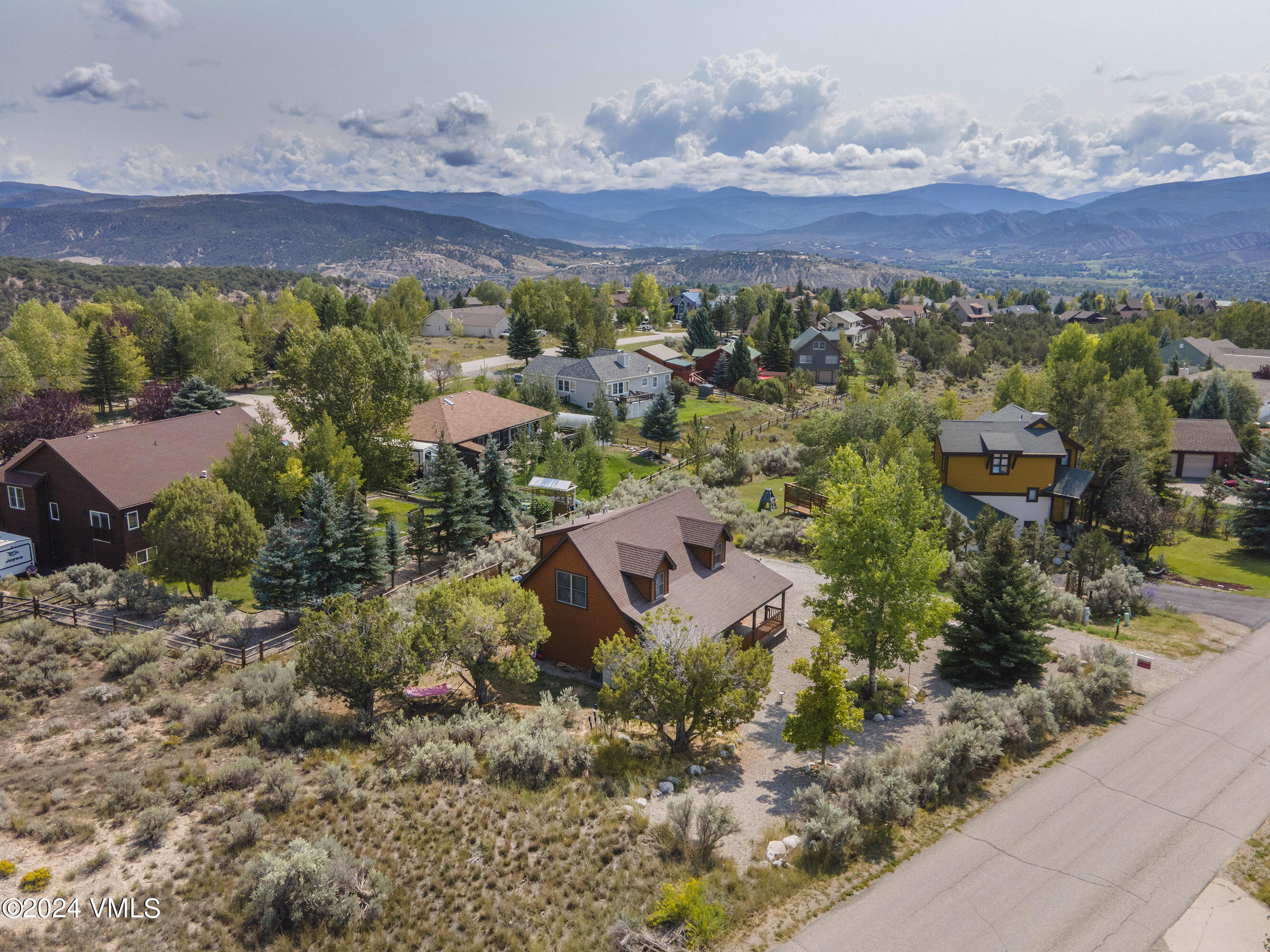 490 Neilson Gulch Road Eagle, CO 81631 - Photo 3 of 55 a view of a city with mountains in the background