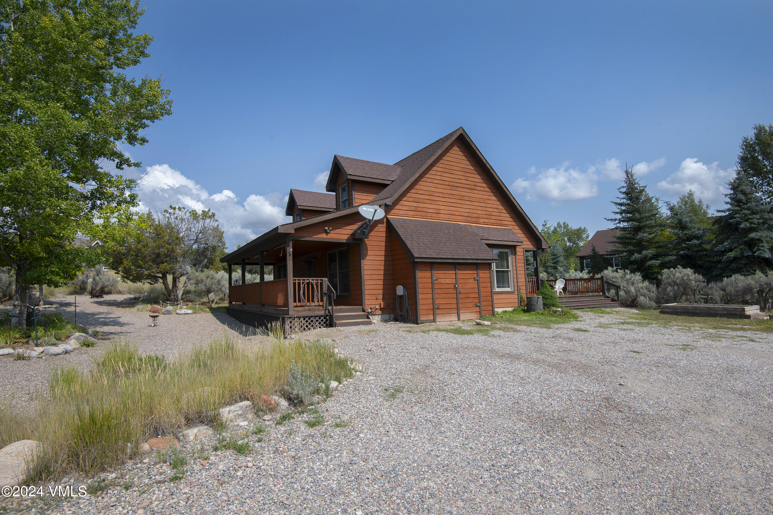 490 Neilson Gulch Road Eagle, CO 81631 - Photo 33 of 55 a front view of a house with a yard