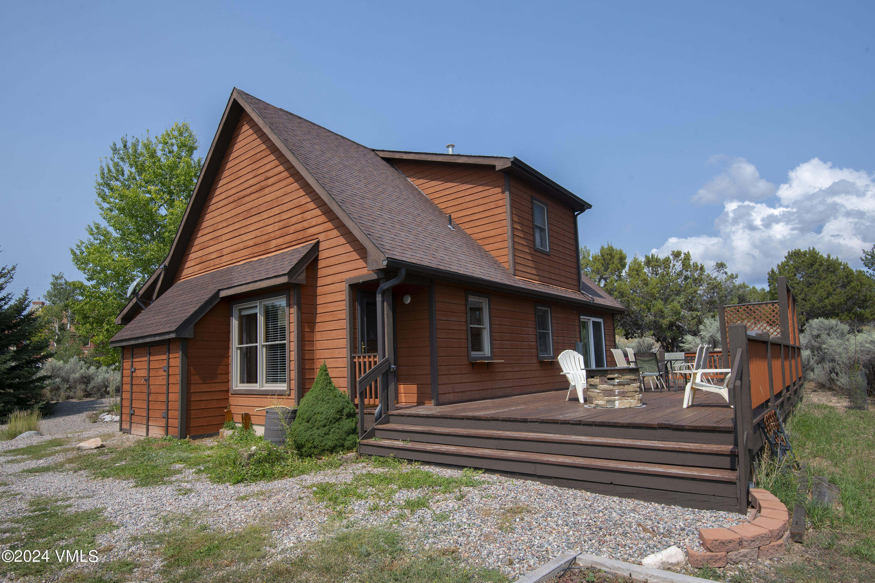 490 Neilson Gulch Road Eagle, CO 81631 - Photo 36 of 55 a front view of a house with a yard