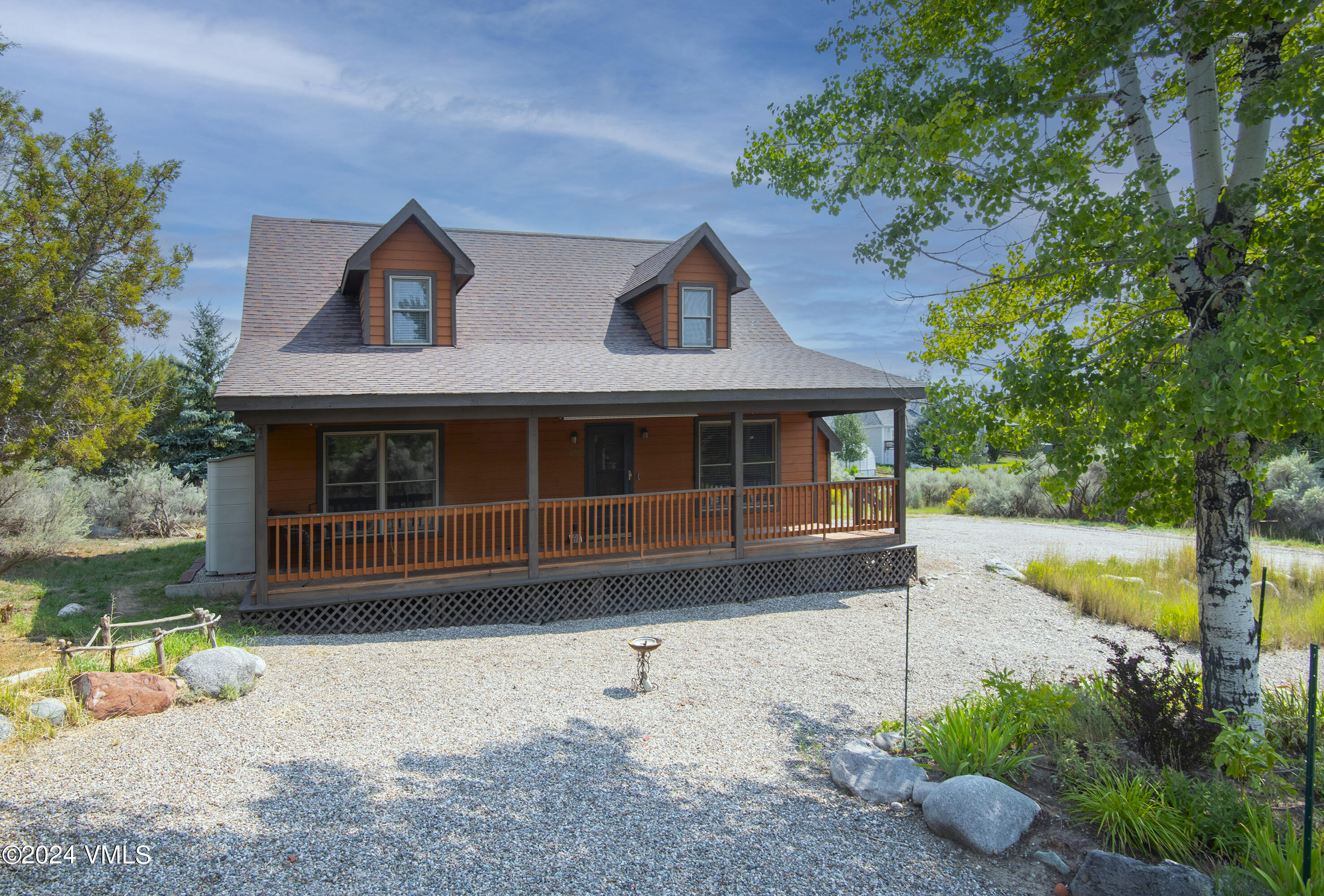 490 Neilson Gulch Road Eagle, CO 81631 - Photo 37 of 55 a front view of a house with garden