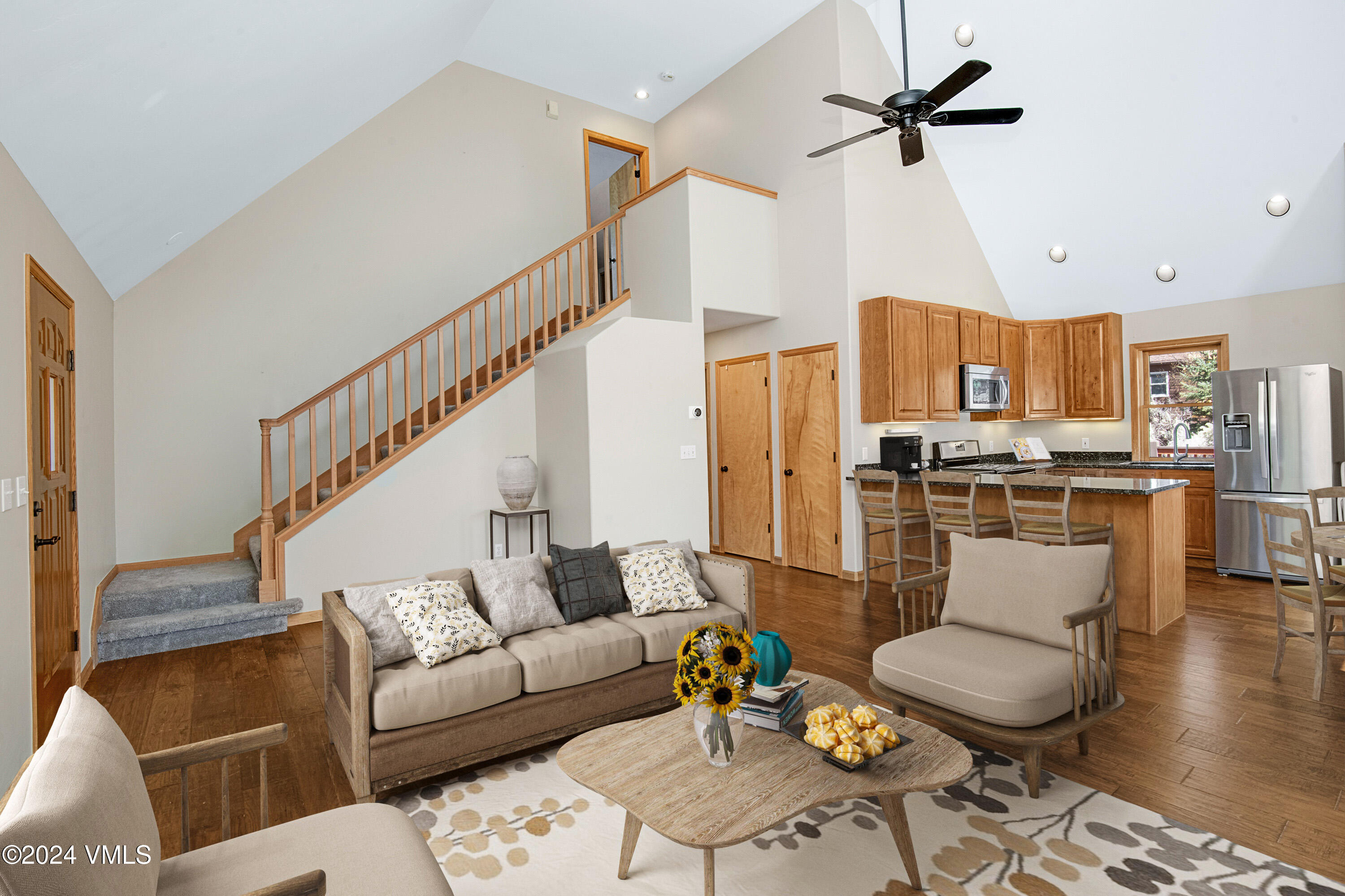 490 Neilson Gulch Road Eagle, CO 81631 - Photo 4 of 55 a living room with furniture and kitchen view