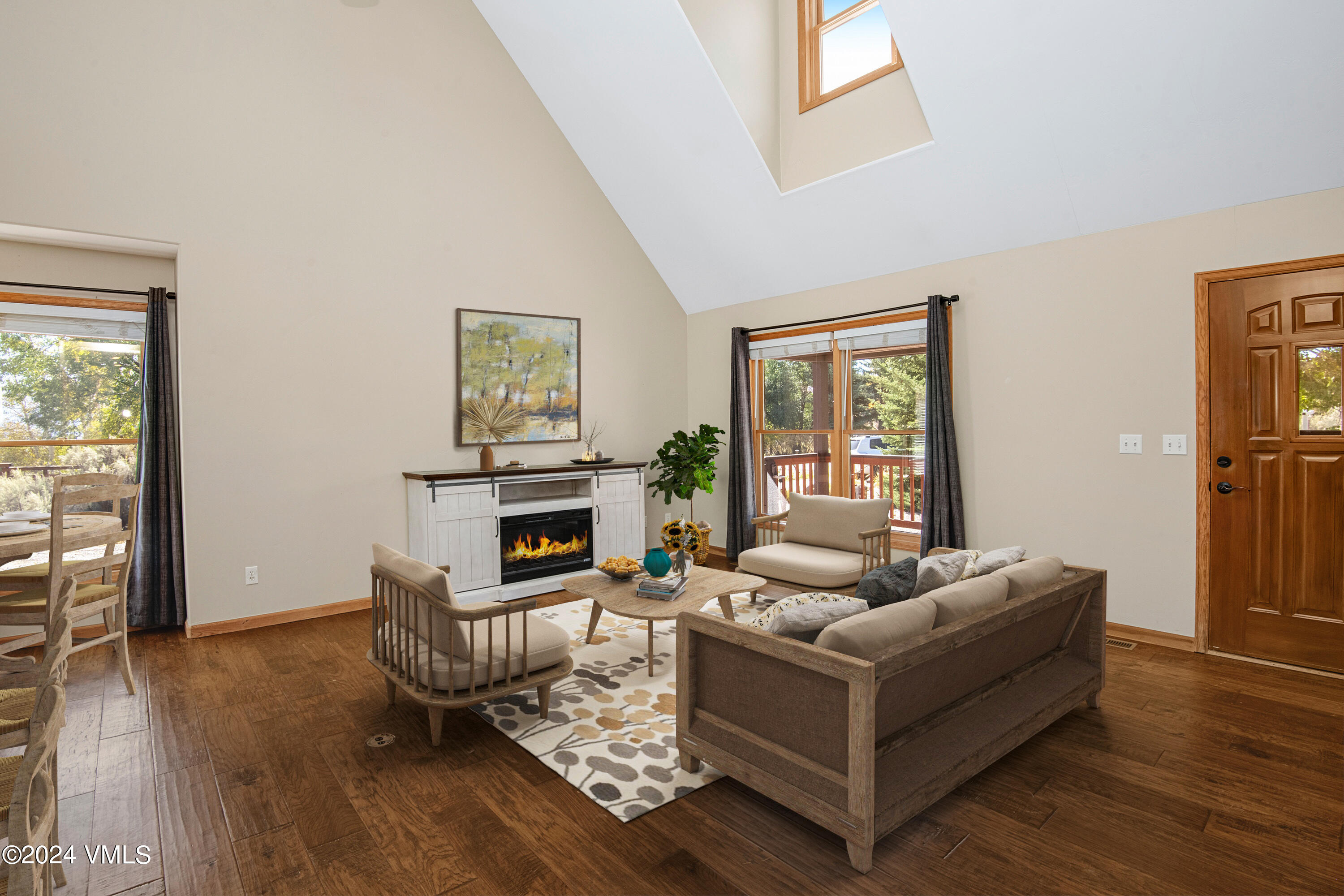 490 Neilson Gulch Road Eagle, CO 81631 - Photo 5 of 55 a living room with furniture and wooden floor