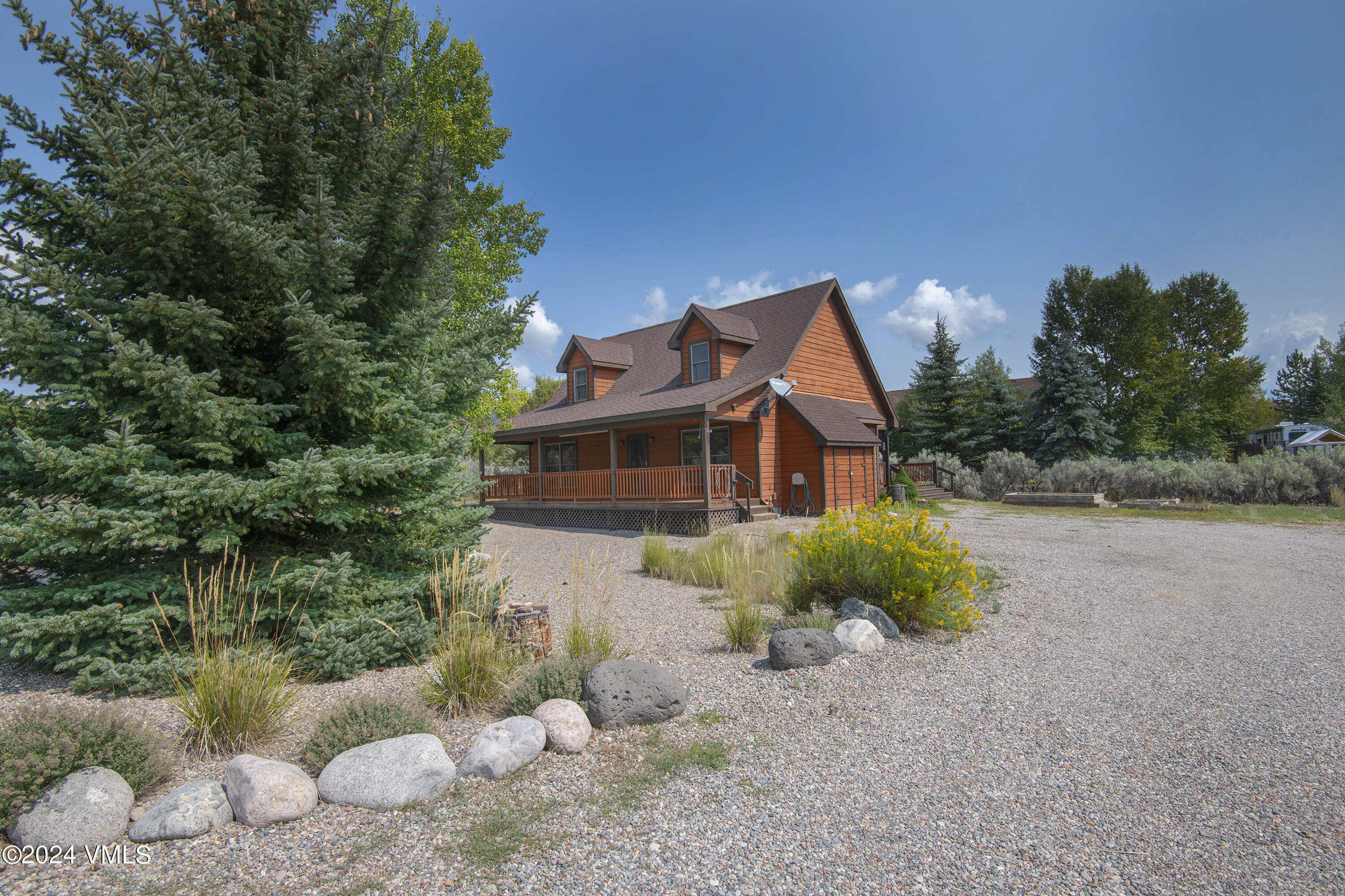 490 Neilson Gulch Road Eagle, CO 81631 - Photo 7 of 55 a front view of a house with a yard