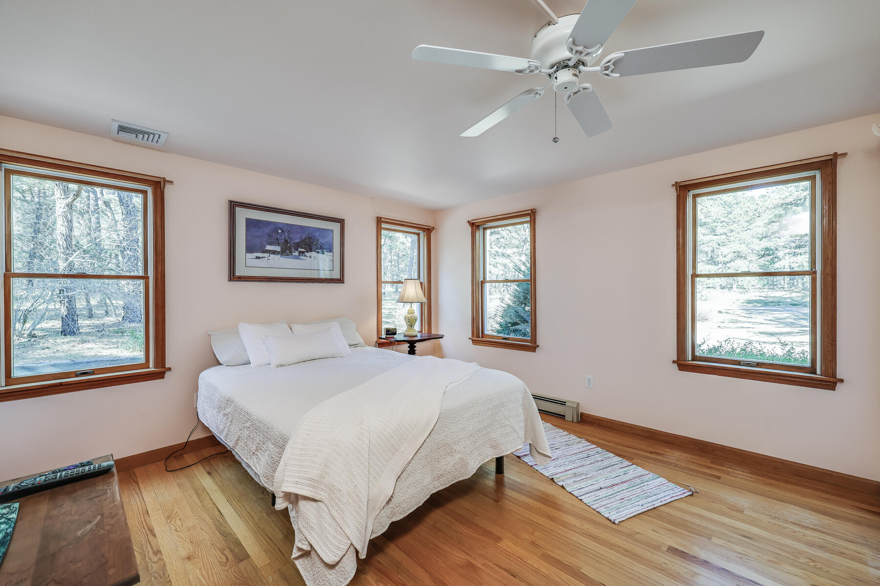 35 Sea Pine Road Wellfleet, MA 02667 - Photo 13 of 36 a bedroom with a bed chandelier and a window