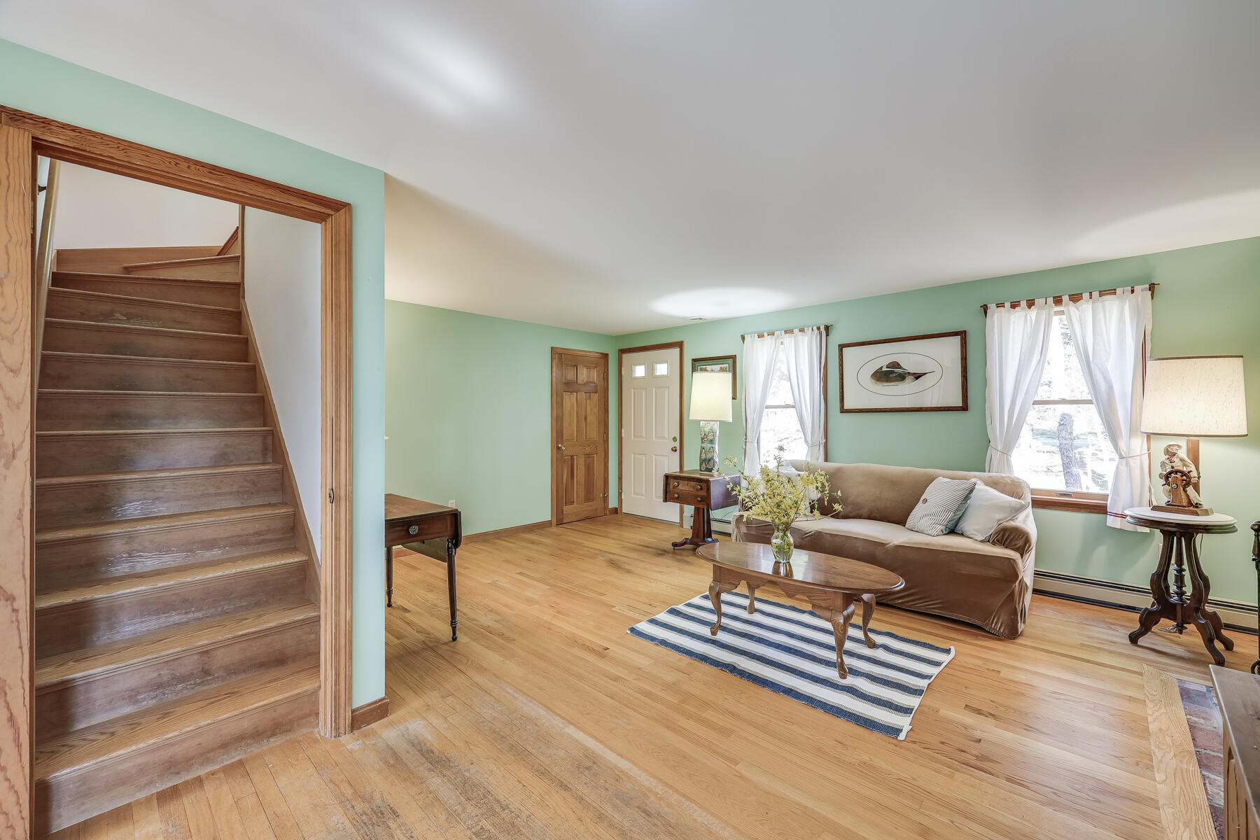 35 Sea Pine Road Wellfleet, MA 02667 - Photo 18 of 36 a living room with furniture and a wooden floor