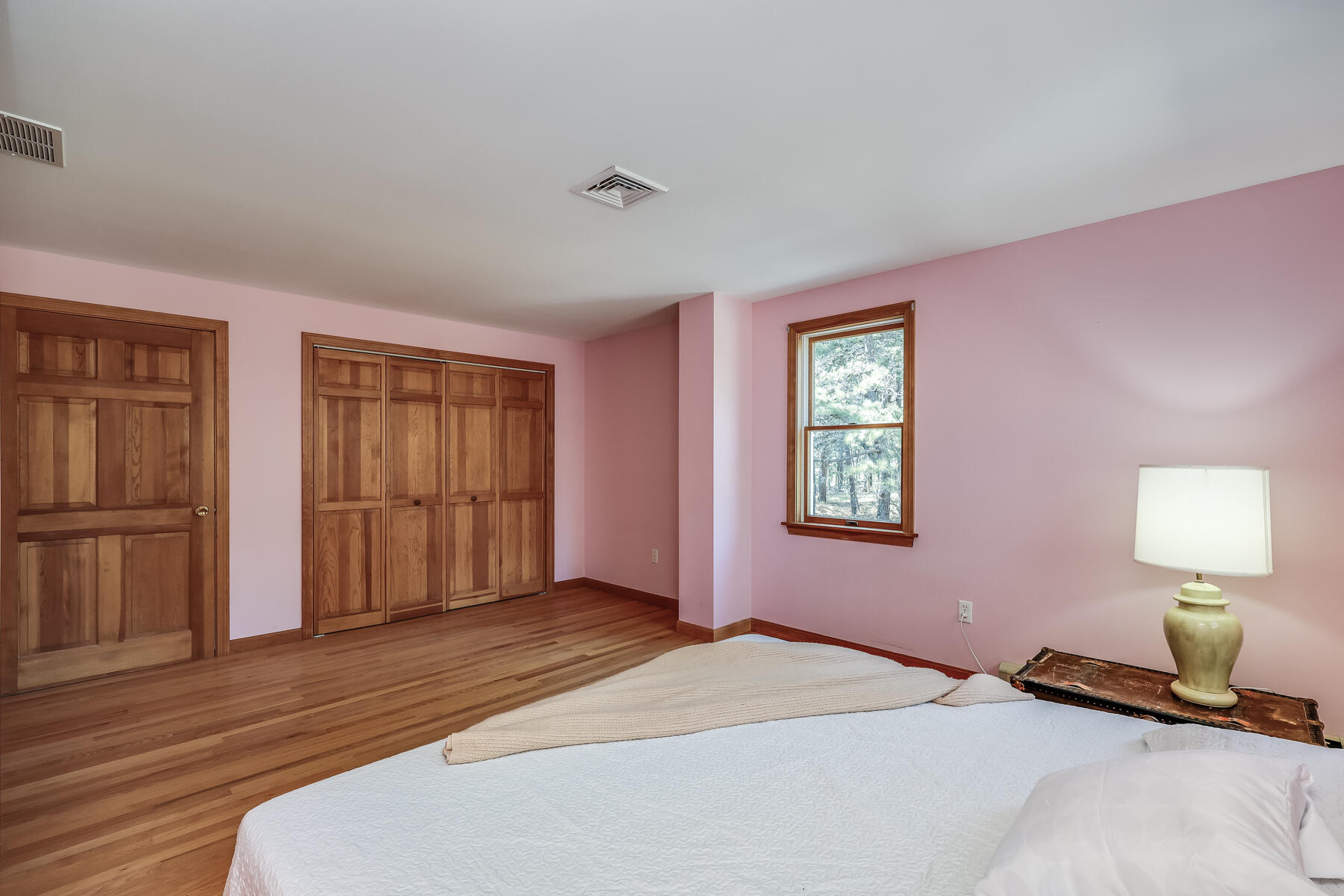 35 Sea Pine Road Wellfleet, MA 02667 - Photo 21 of 36 a bedroom with a bed and a window