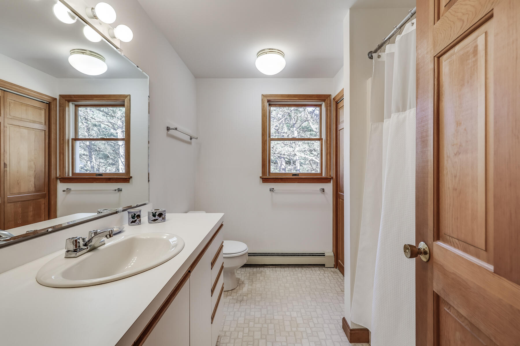 35 Sea Pine Road Wellfleet, MA 02667 - Photo 22 of 36 a bathroom with a sink and a mirror