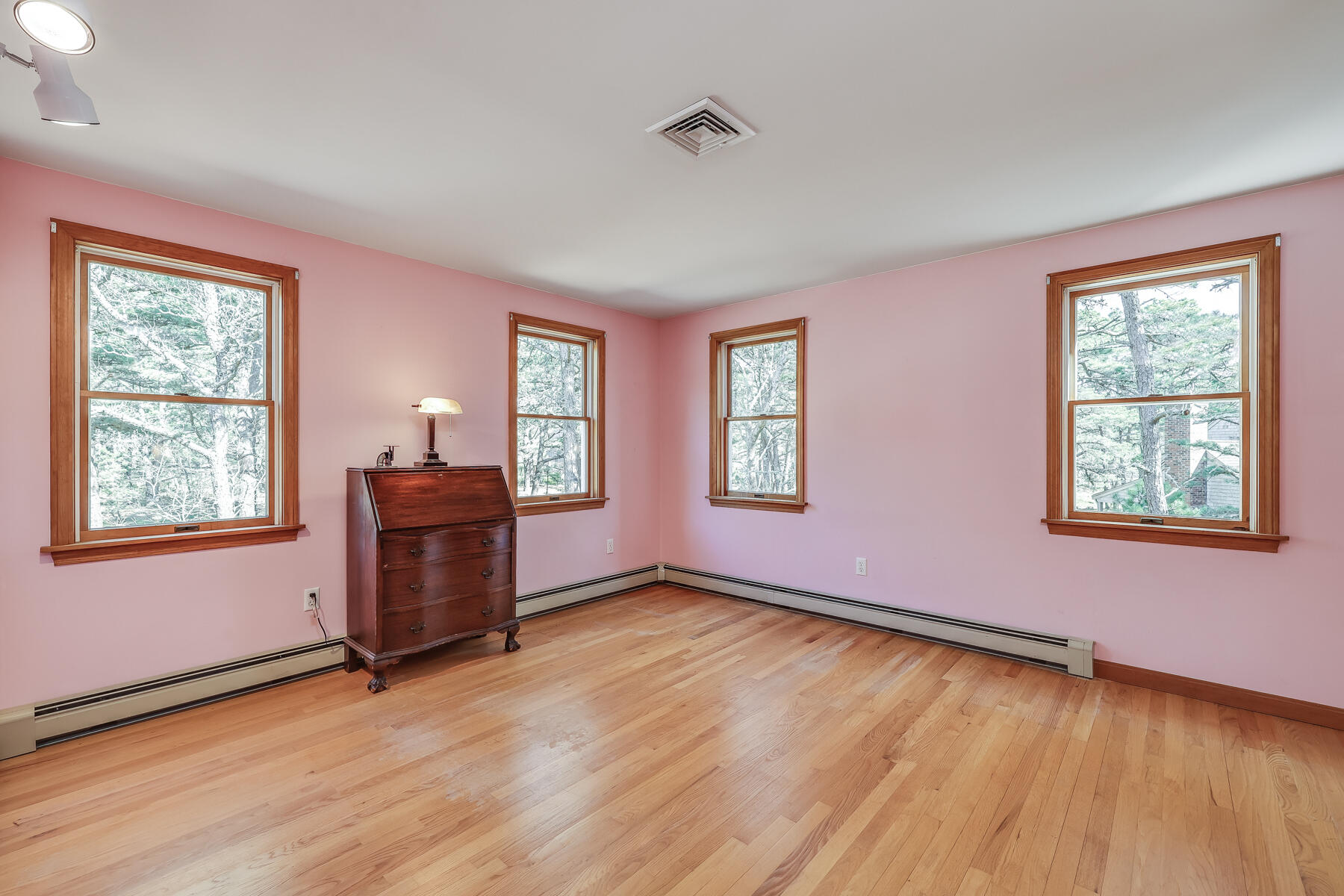 35 Sea Pine Road Wellfleet, MA 02667 - Photo 23 of 36 a view of an empty room with a window and wooden floor
