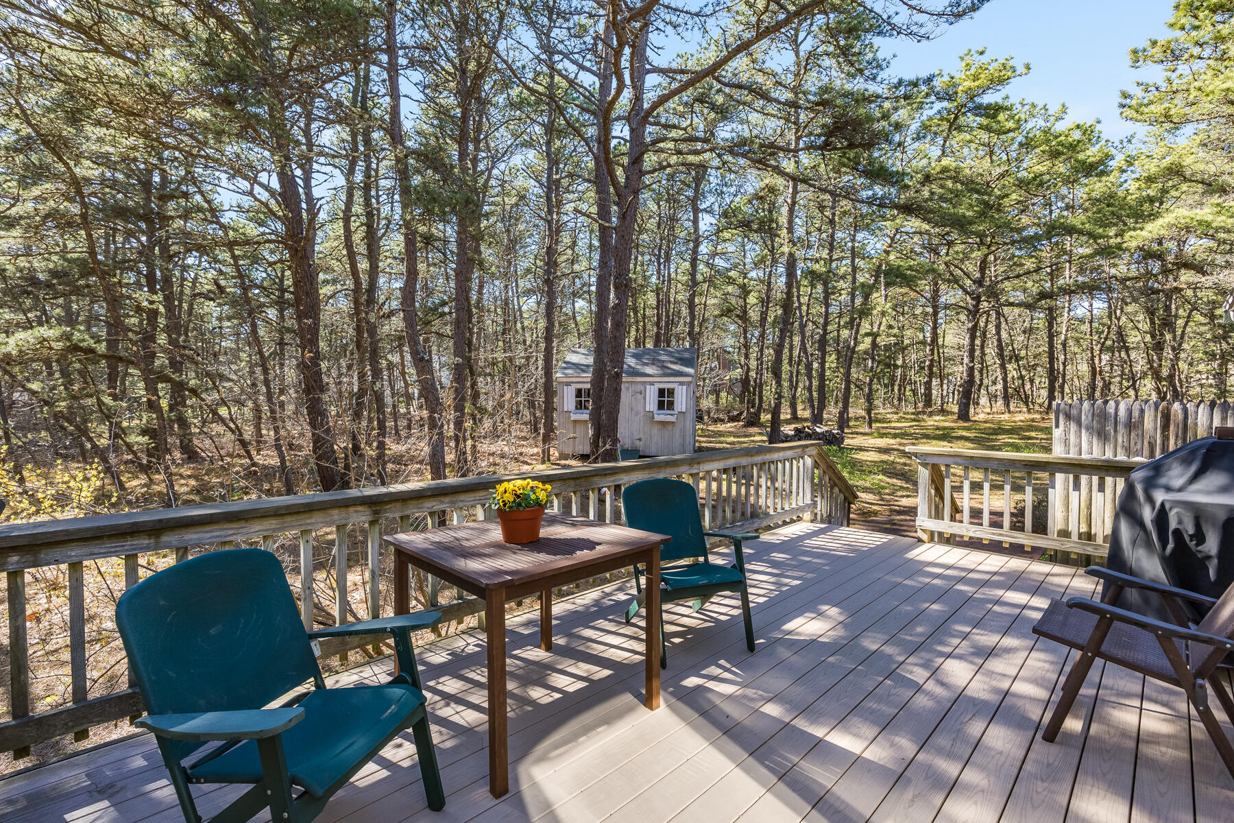 35 Sea Pine Road Wellfleet, MA 02667 - Photo 25 of 36 a view of a chairs and table in the patio