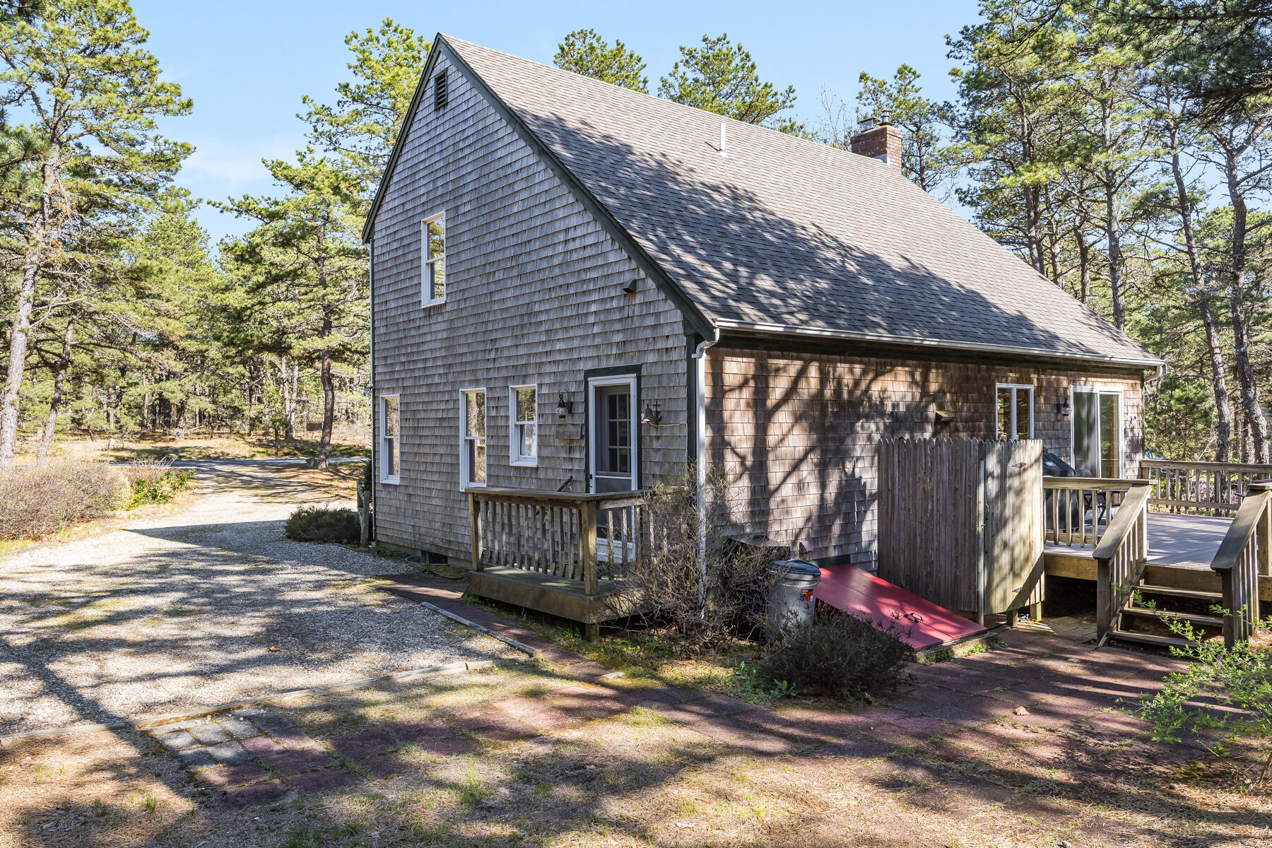 35 Sea Pine Road Wellfleet, MA 02667 - Photo 26 of 36 a view of a house with backyard