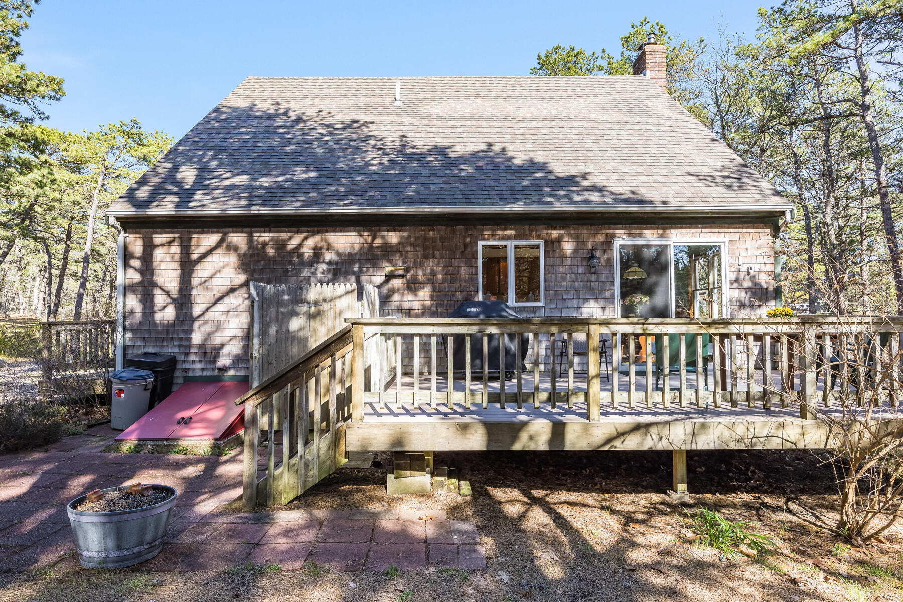 35 Sea Pine Road Wellfleet, MA 02667 - Photo 30 of 36 front view of a house with a balcony