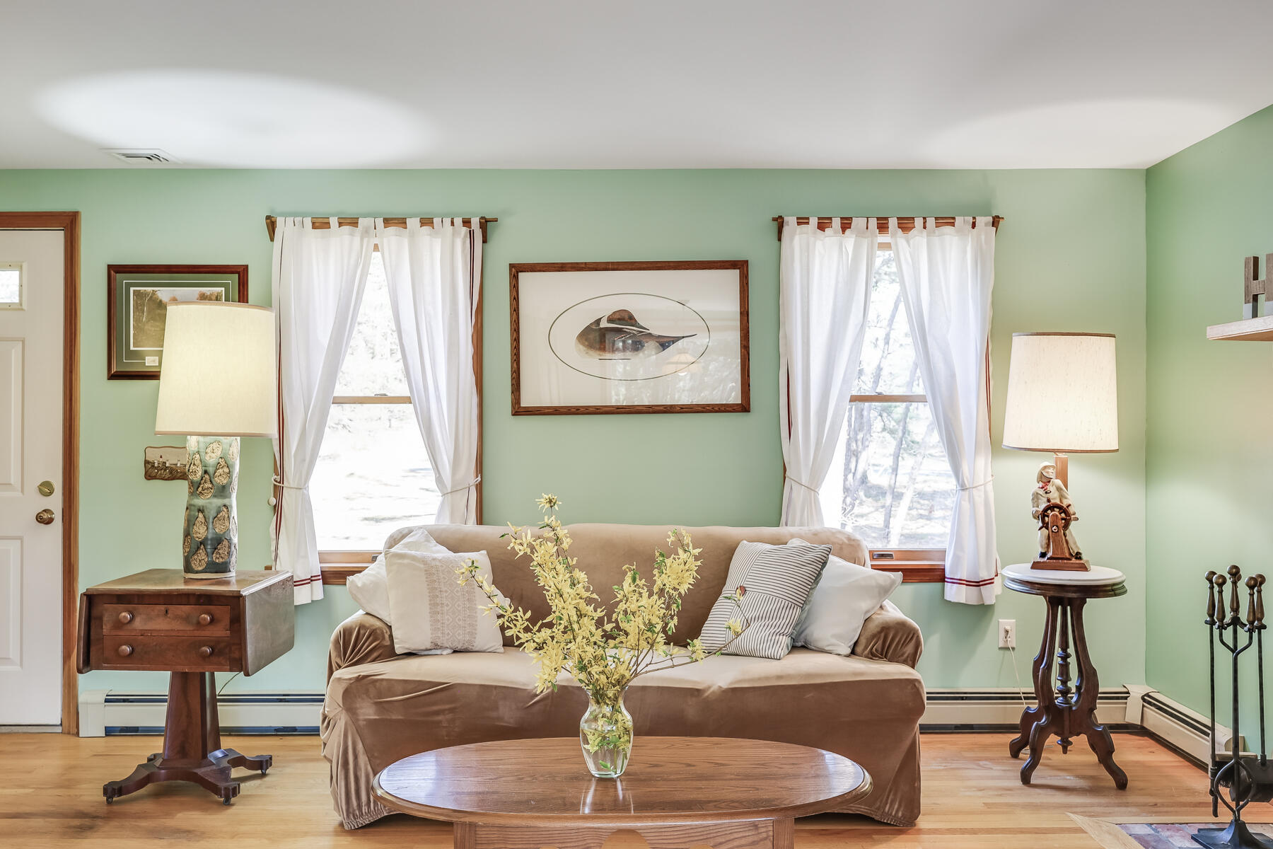 35 Sea Pine Road Wellfleet, MA 02667 - Photo 3 of 36 a living room with furniture and a large window