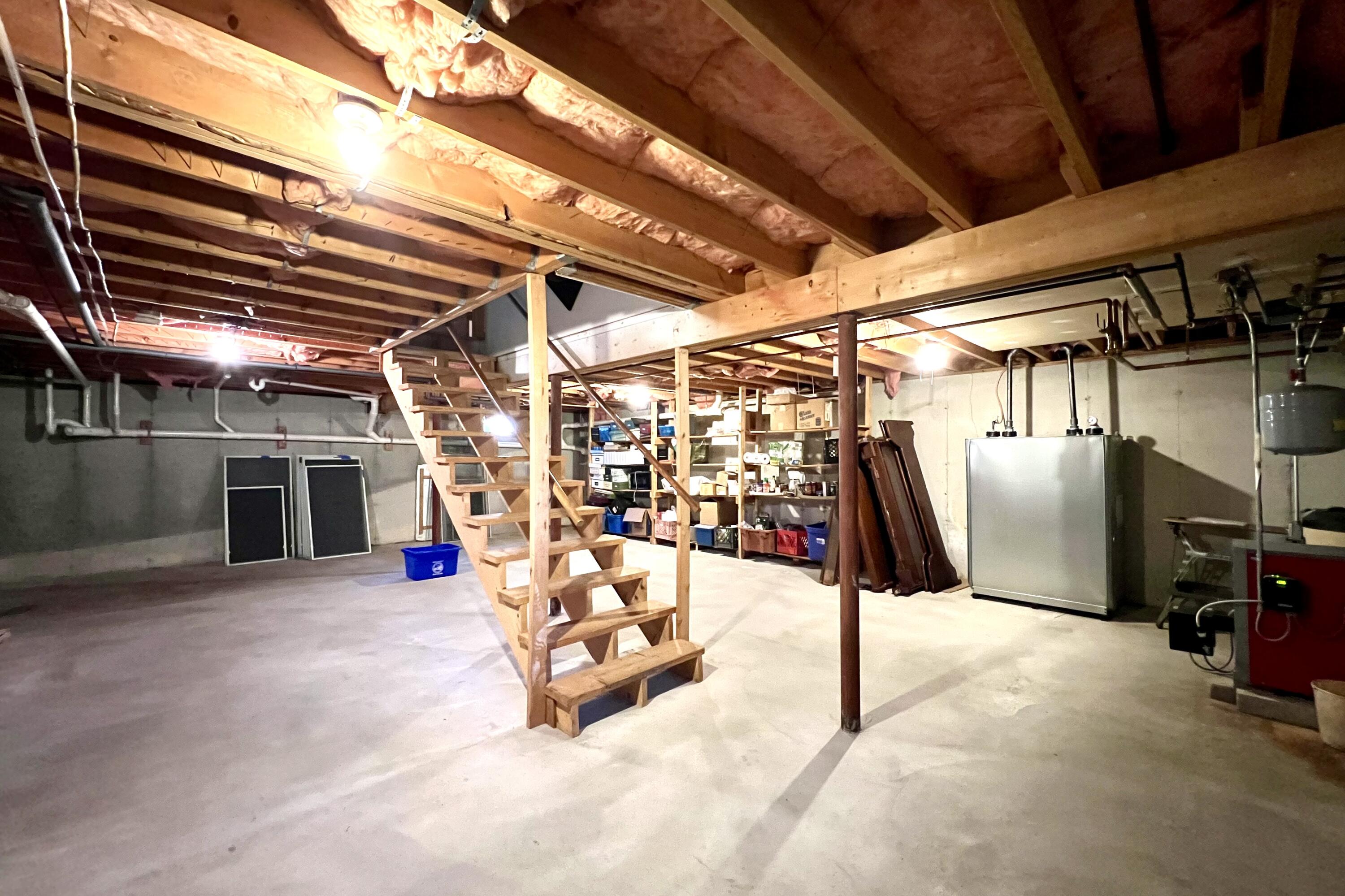 35 Sea Pine Road Wellfleet, MA 02667 - Photo 33 of 36 a view of a garage with wooden table and chairs