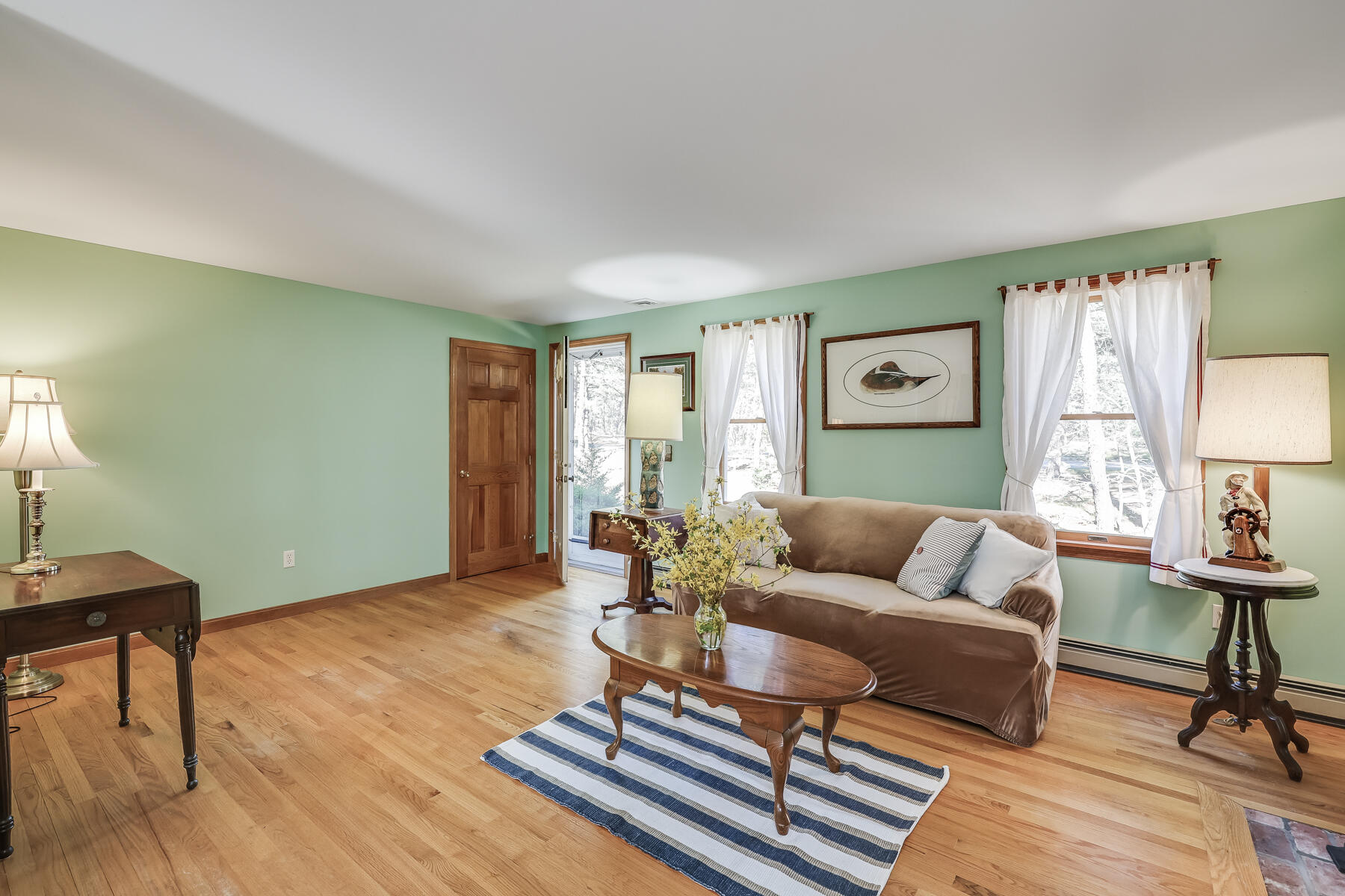 35 Sea Pine Road Wellfleet, MA 02667 - Photo 4 of 36 a living room with furniture and a window