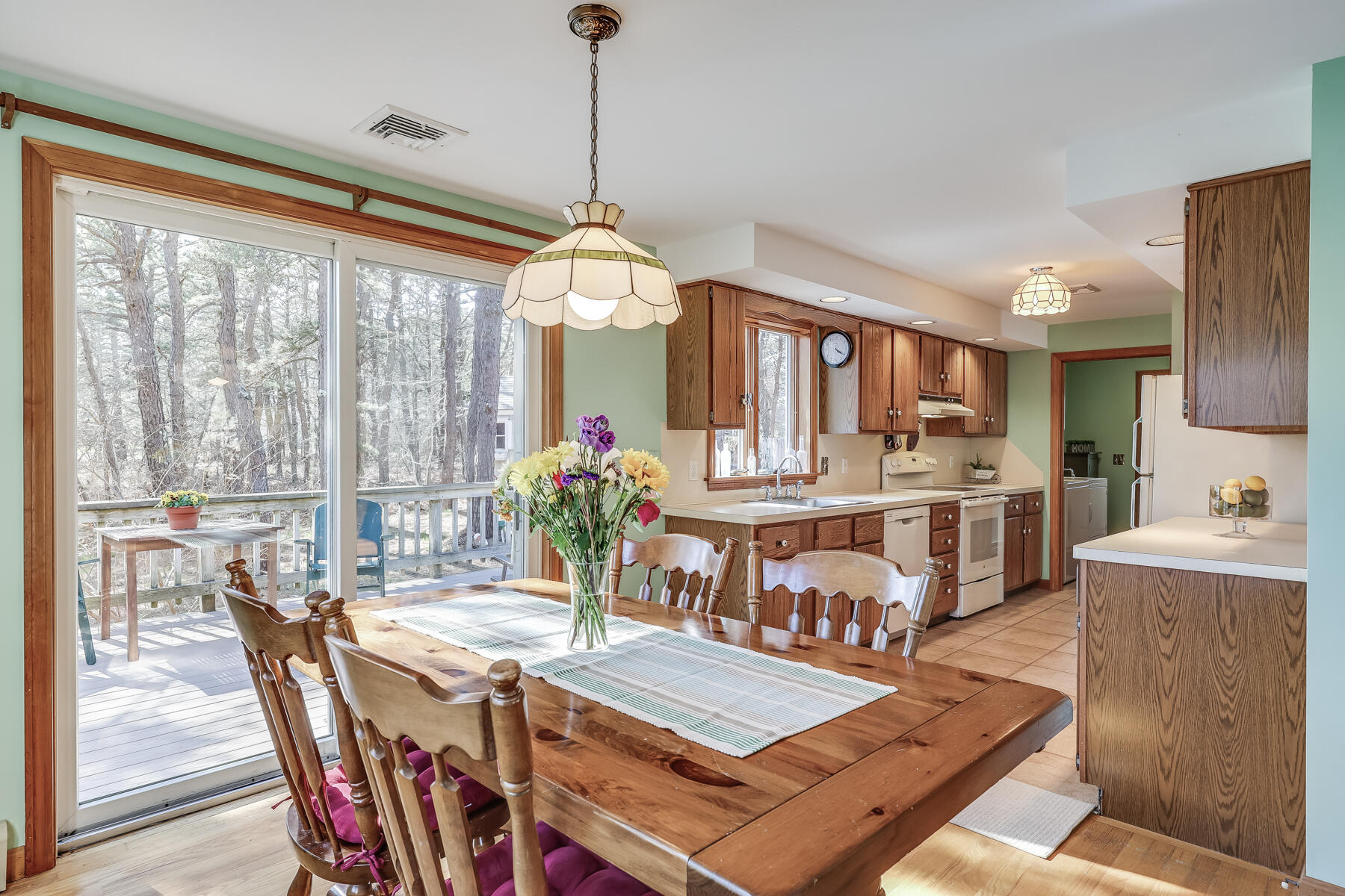 35 Sea Pine Road Wellfleet, MA 02667 - Photo 7 of 36 a view of a dining room with furniture window and outside view