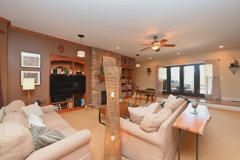 a view of a hallway with seating area