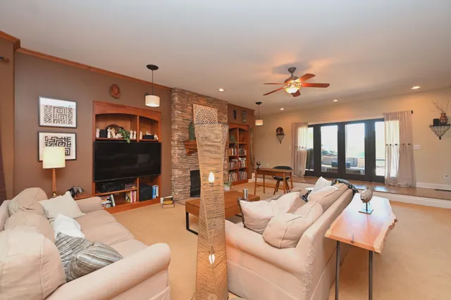 a view of a hallway with seating area