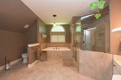 a front view of house with garden