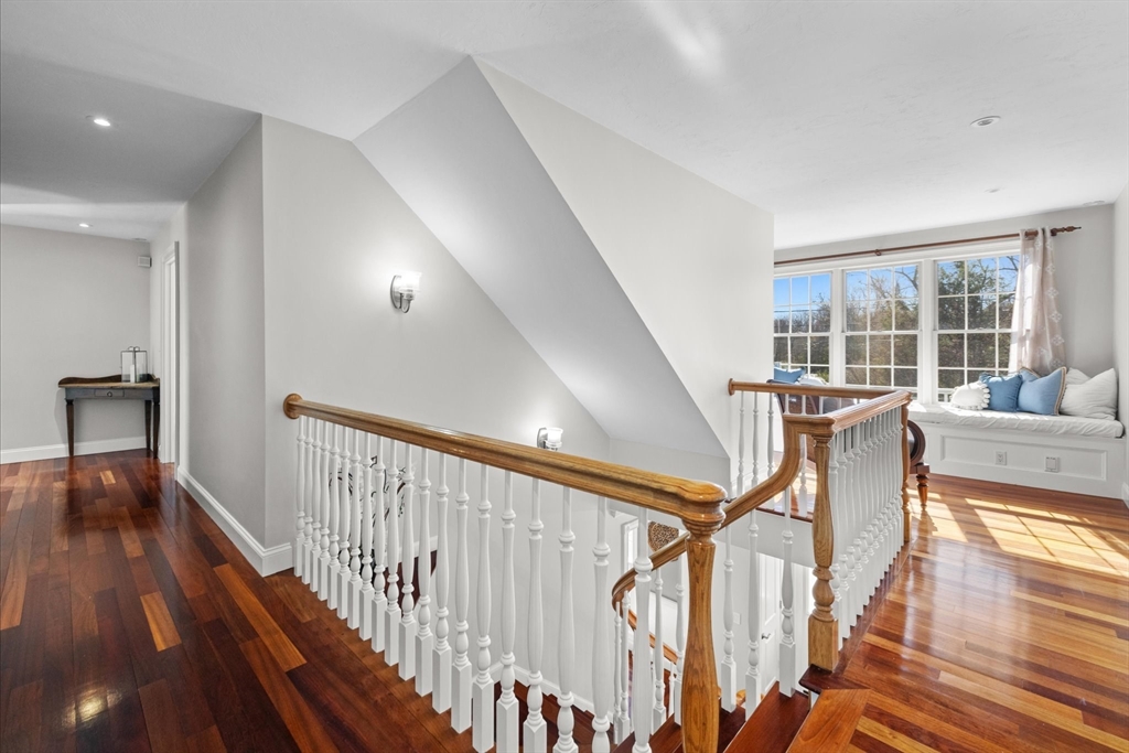 735 Bay Road Duxbury, MA 02332 - Photo 14 of 40 a view of a hallway with wooden floor and stairs