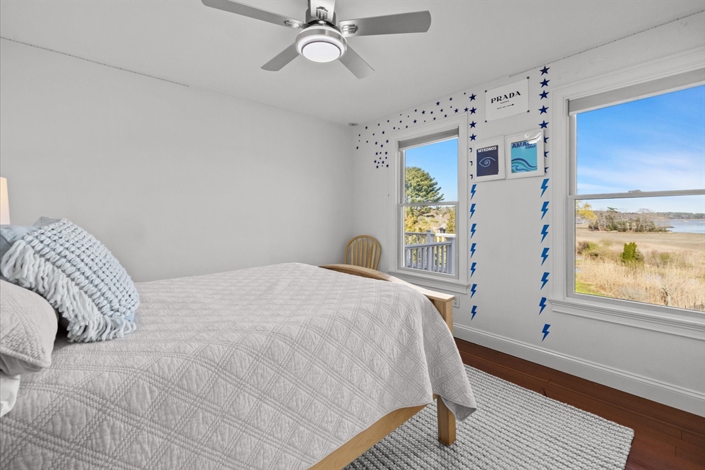 735 Bay Road Duxbury, MA 02332 - Photo 20 of 40 a bedroom with a bed and a window