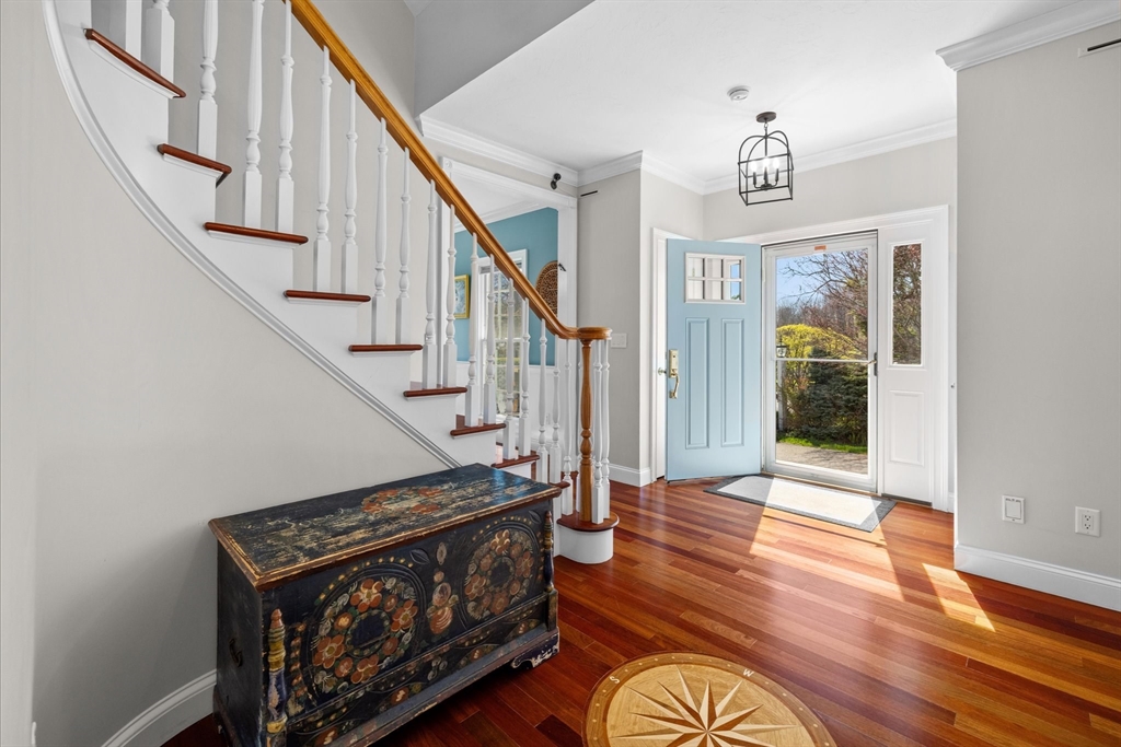 735 Bay Road Duxbury, MA 02332 - Photo 3 of 40 a view of entryway and hall with wooden floor