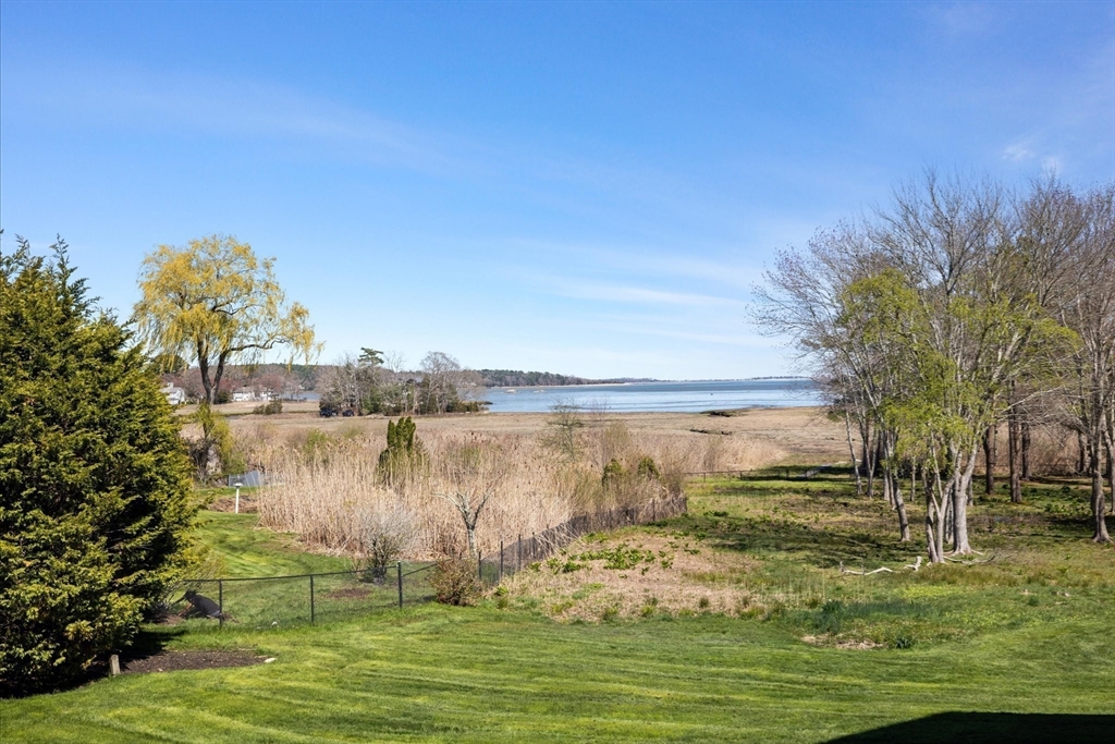 735 Bay Road Duxbury, MA 02332 - Photo 38 of 40 a view of a lake with a big yard