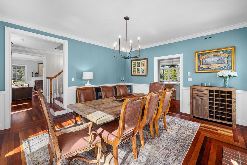 735 Bay Road Duxbury, MA 02332 - Photo 6 of 40 a view of a dining room with furniture a chandelier and wooden floor