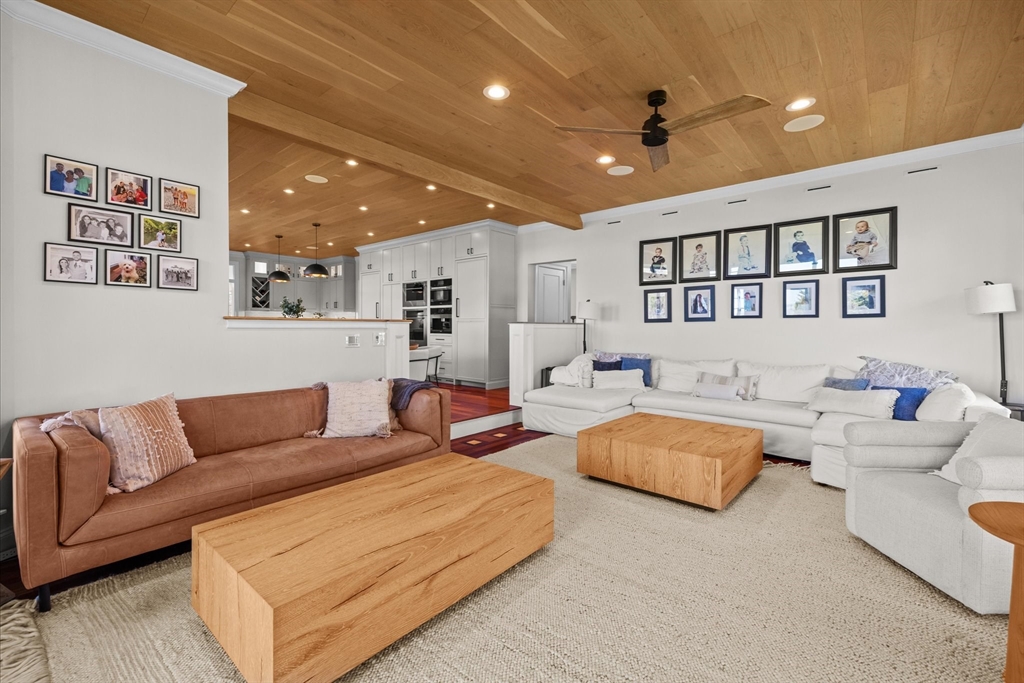 735 Bay Road Duxbury, MA 02332 - Photo 8 of 40 a living room with furniture and a ceiling fan