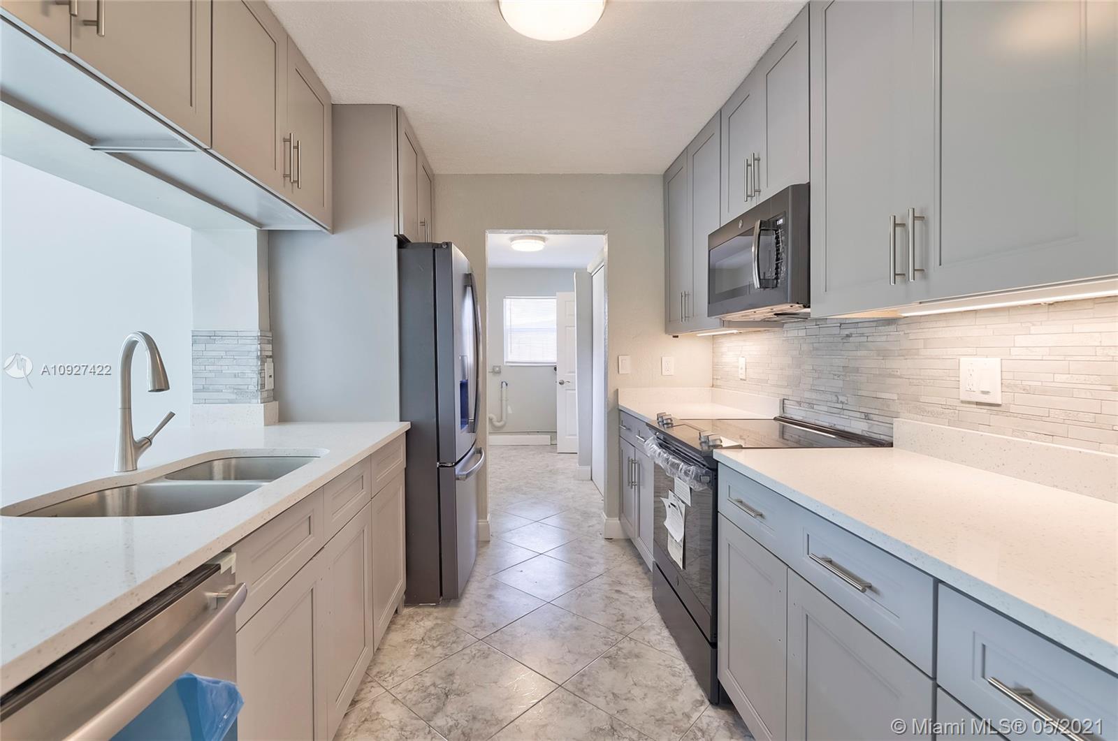 6118 Hogan Creek Road Margate, FL 33063 - Photo 11 of 39 Gallery Image 11