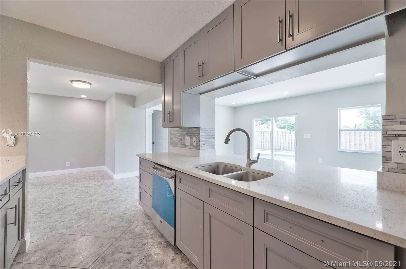 6118 Hogan Creek Road Margate, FL 33063 - Photo 9 of 39 Gallery Image 9