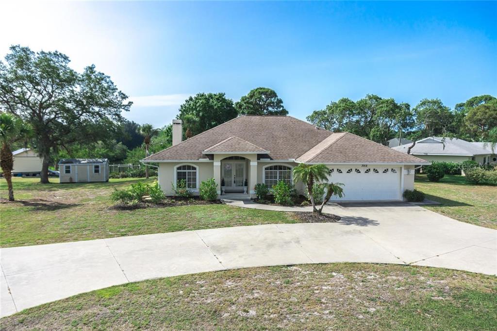 3918 Sterling Road Venice, FL 34293 - Photo 1 of 1 a view of house with outdoor space and street view