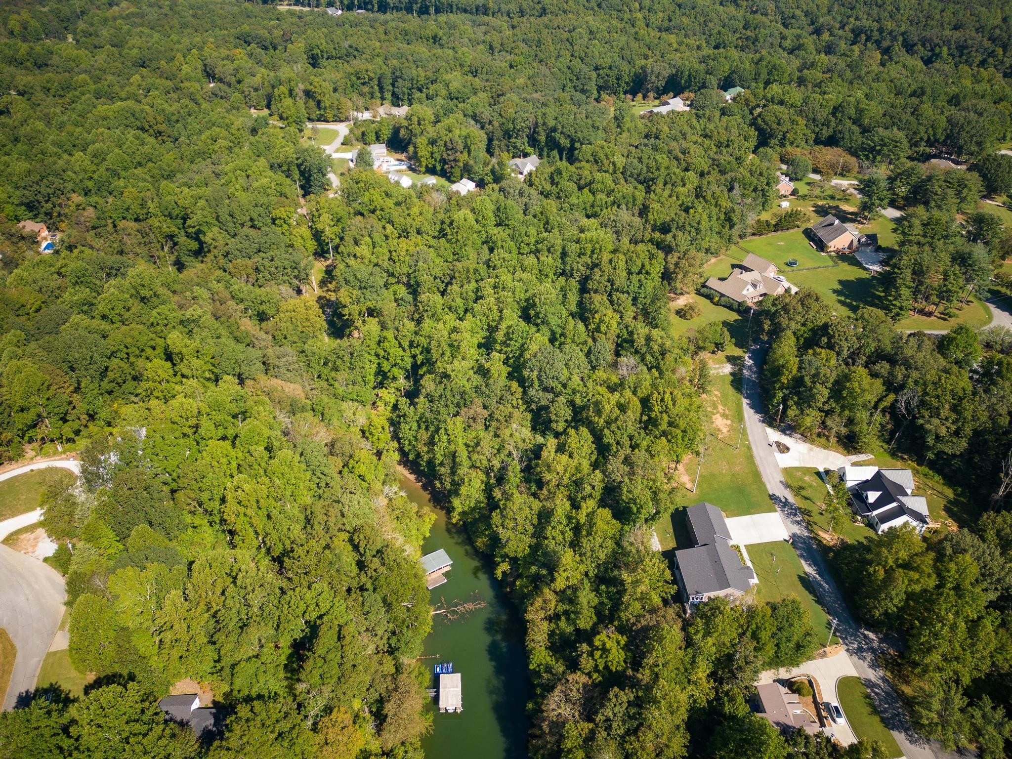 0 Rigsbys Ridge Lynchburg, TN 37352 - Photo 8 of 21 an aerial view of residential houses with outdoor space and trees