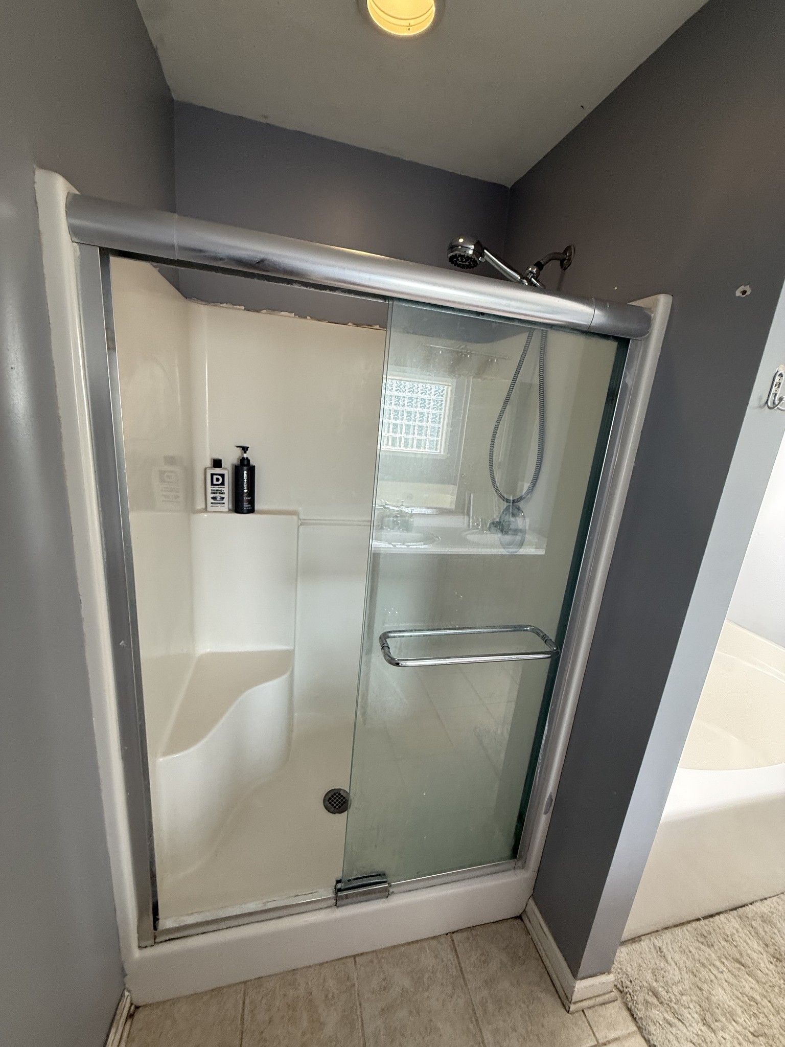 1702 Abiff Road Burns, TN 37029 - Photo 36 of 47 a bathroom with a glass shower door