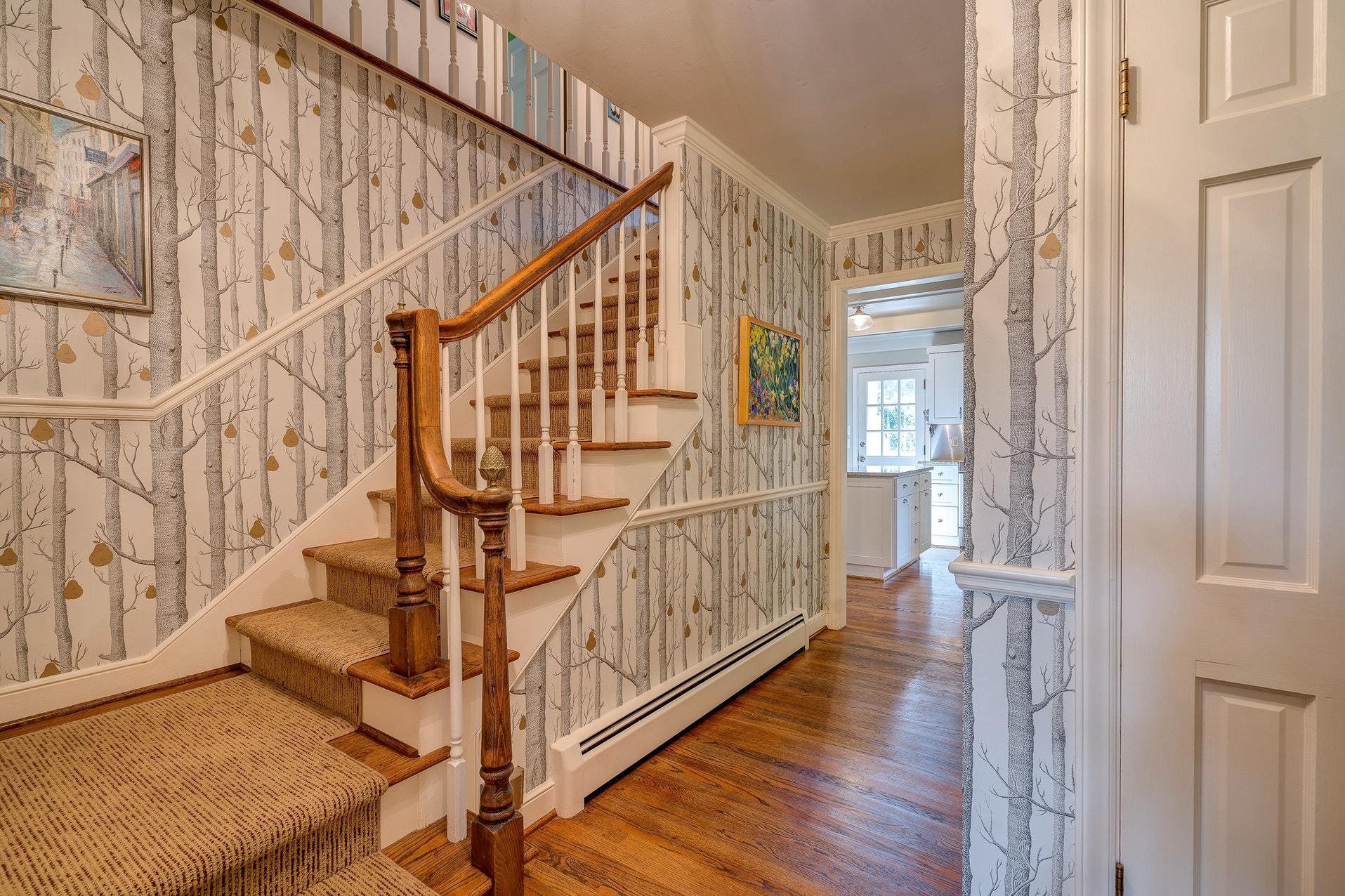 209 Parkcrest Road Southwest Roanoke, VA 24014 - Photo 3 of 48 a view of entryway with wooden floor and stairs