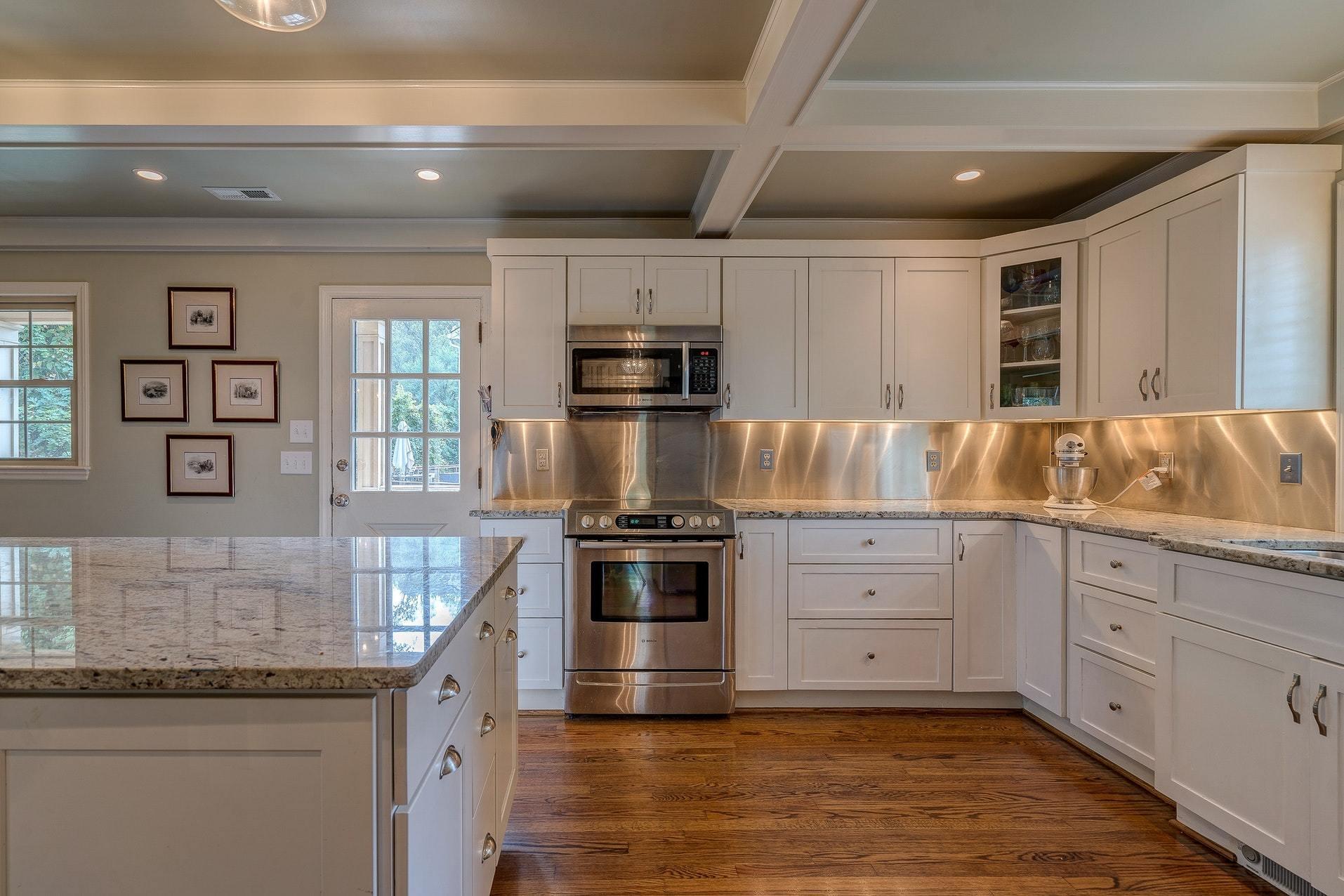 209 Parkcrest Road Southwest Roanoke, VA 24014 - Photo 22 of 48 a kitchen with granite countertop a stove and a sink